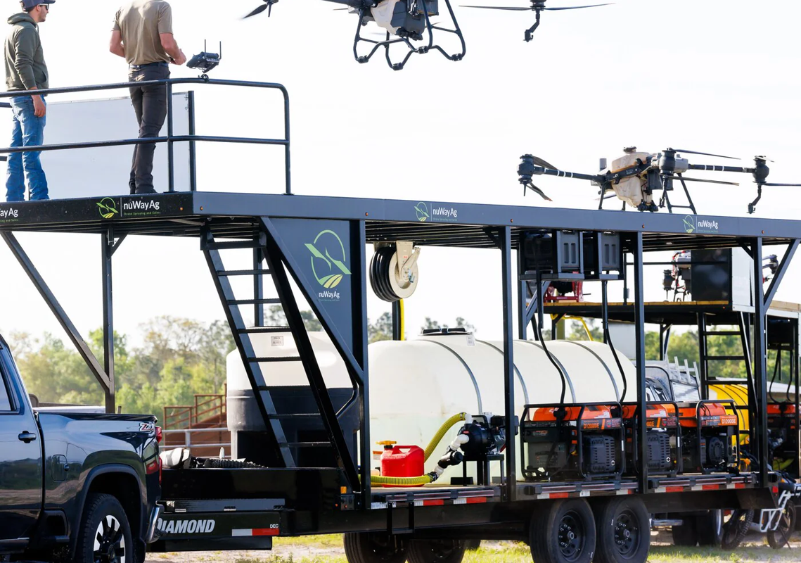Drone operation platform with operators and flying drones
